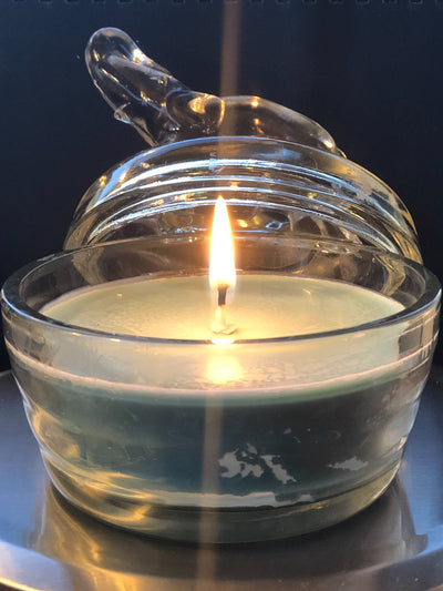 This is a custom candle in a jar provided separately from a client